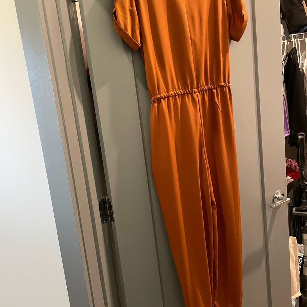 Orange FashionNova jumpsuit
